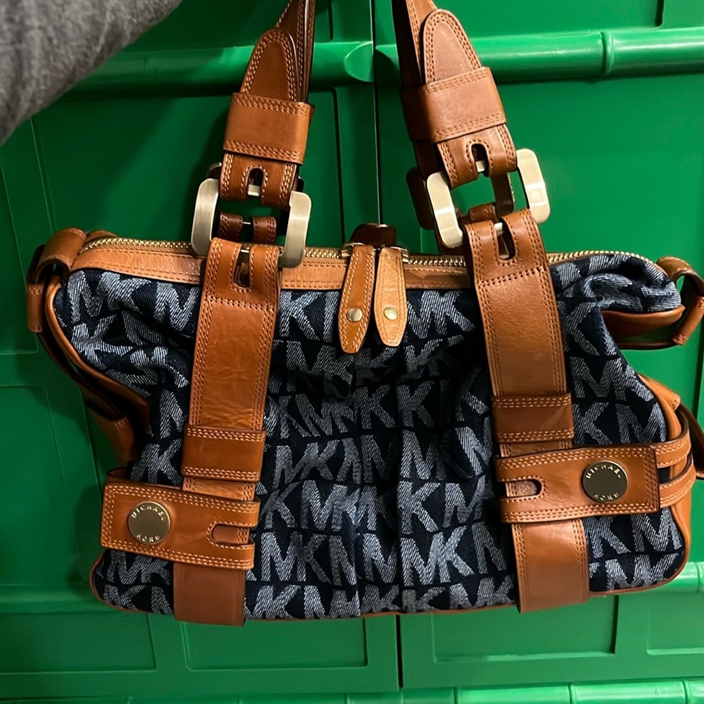 Authentic denim and leather Michael Kors handbag.